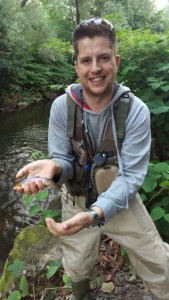 A tiddler of a wild brown trout from the river Cynon August 2016 on fly